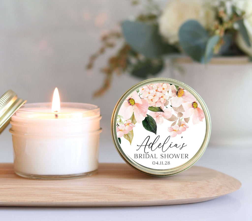 Personalized bridal shower candle favor with blush floral label, perfect eco-friendly gift for guests.