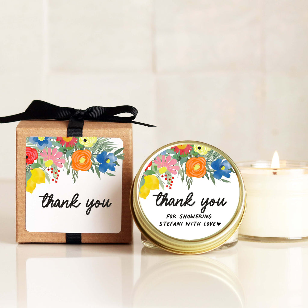 Colorful baby shower candle and favor box with floral design, perfect thank you gift. Stylish primary color decor.