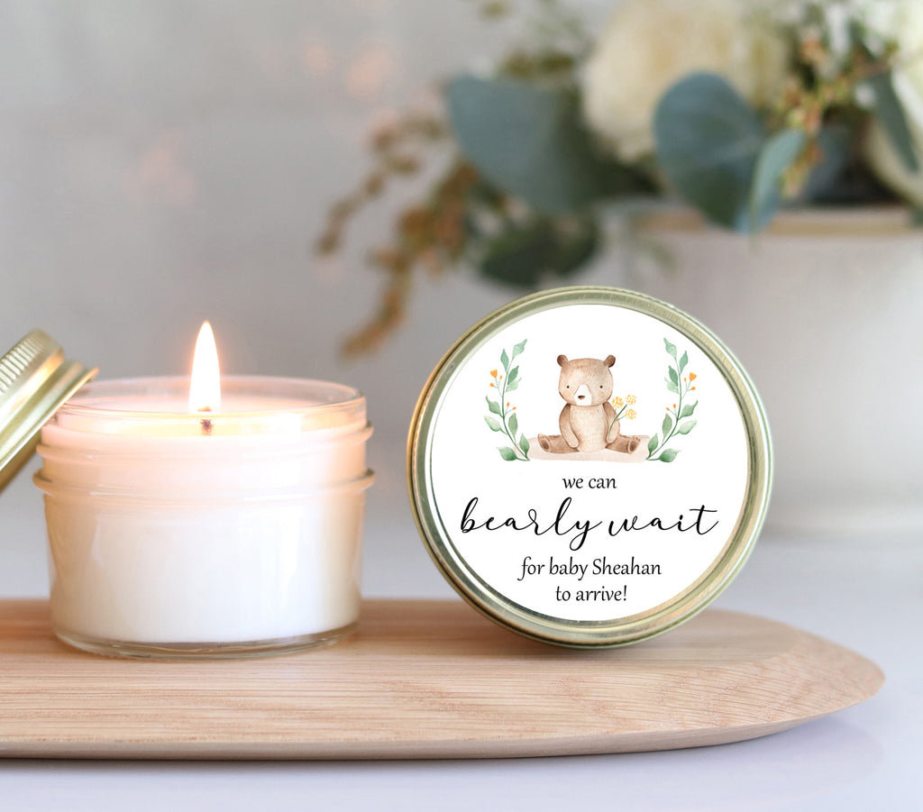 Personalized We Can Bearly Wait baby shower candle favor with cute bear label on wooden tray.