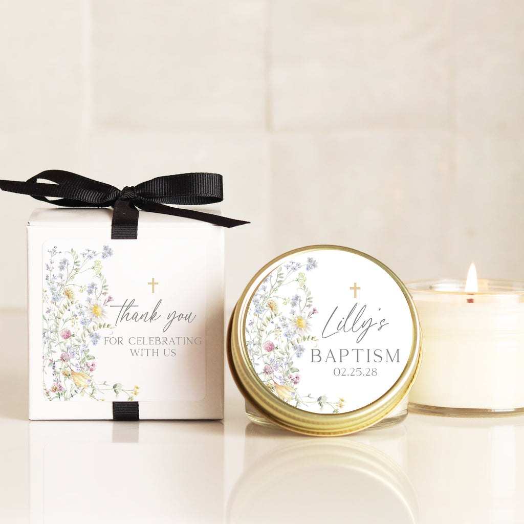 Eco-friendly baptism candle favors with wildflower labels and personalized packaging for christening favors.