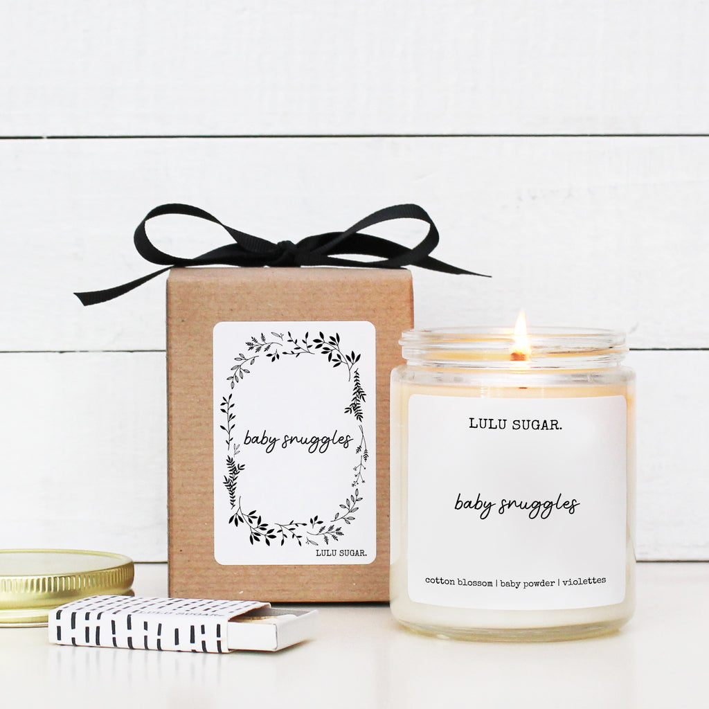 baby snuggles candle with box and ribbon