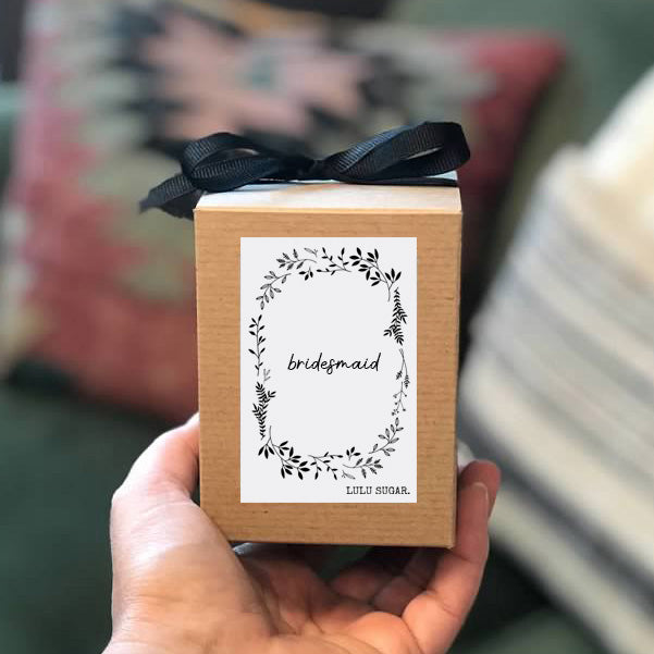 hand holding bridesmaid candle